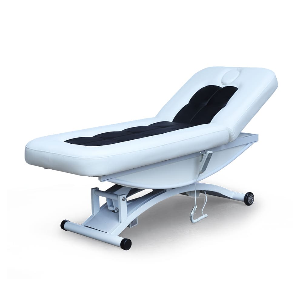 black and white massage bed